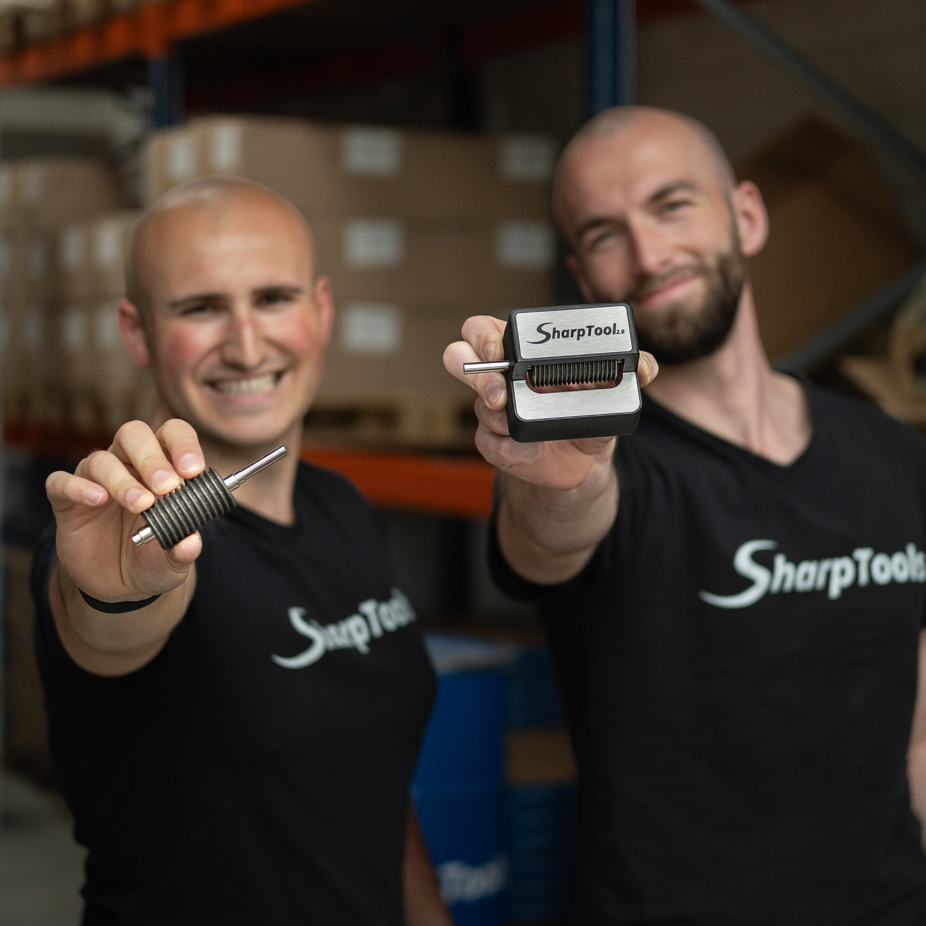founders sharptools holding the tools in front of them. The original multitool blade sharpener